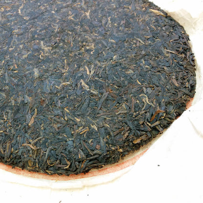 Aged raw puerh tea by Jing Tea Shop